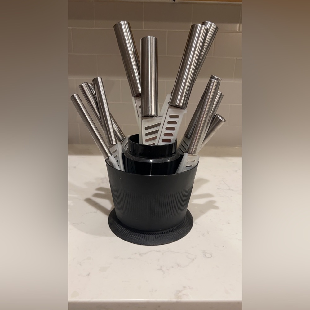 Knife set with safety covers. Rarely used. Set of 12.